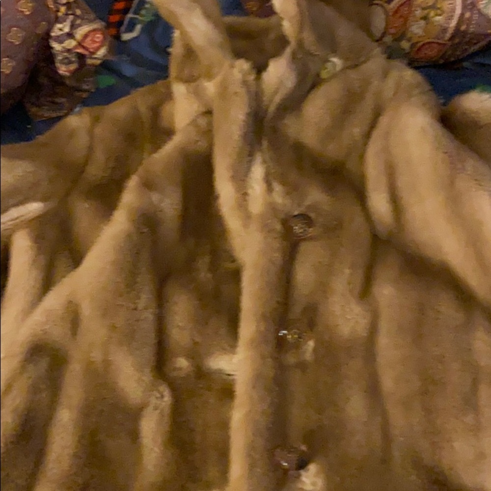 An nice lady like warm fur coat